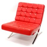 A chrome plated and red leather Barcelona chair, with buttoned upholstery (AF), after the design