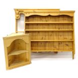 A collection of pine furniture, two plate racks each with shelves, 108cm & 104cm wide