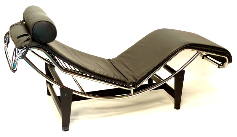 A Le Corbusier style black leather chaise longue or couch, with chromed metal frame and ebonised