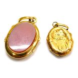 Two small oval lockets, comprising a memorial oval locket, with clear panel to centre, with floral