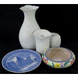 Three items of Kaiser bisque porcelain, to include a baluster shaped vase, a Poole pottery shallow