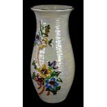 An Arthur Wood lustre Vernon pattern vase, decorated with flowers, 33cm high.