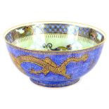 A Wedgwood Dragon lustre bowl, decorated with dragons to the centre on pearlescent ground with