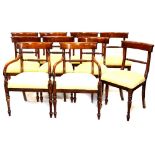 A set of ten mahogany dining chairs, in Regency style, each with a rope twist back, padded seat on