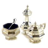 A George V silver three piece cruet, of facetted form, comprising silver salt with blue glass liner,