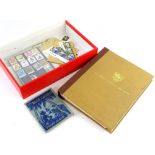 A quantity of stamps, to include a sheet of seven pence stamps, child's stamp album, etc.