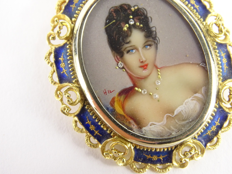 An oval painted brooch of a maiden, the maiden wearing a stone set necklace, tiara and earrings, - Image 2 of 3