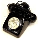 A 1960's GPO 706 type telephone, with bell on/off switch and unusual press to mute switch on