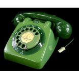 A 1960's GPO 706 green telephone, with bell on/off switch.