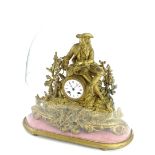 A late 19thC French gilt metal figural mantel clock, the enamel dial with Roman numerals, on a