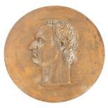 A terracotta profile plaque, cast in the form of a gentleman, circular, 47cm diameter.