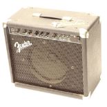 A small Fender guitar amplifier, model Frontman 25R.