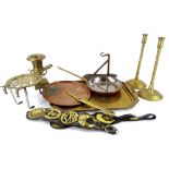 A collection of metalware, to include an Arts and Crafts copper bracket, horse brasses, pan lids,