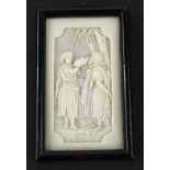 A late 19thC carved ivory biblical panel, depicting a young lady giving water to a man, possibly