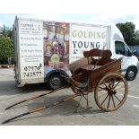 A late 19th/early 20thC mahogany and brass Governess cart or trap, with ash spoked wheels,