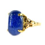 A 9ct gold polished sapphire ring, the ring with natural uncut stone in four claw setting, with