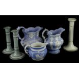 A collection of 19thC ceramics, to include two similar relief moulded jugs with a purple glaze,