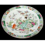 A late 19thC/early 20thC oriental porcelain charger, decorated with famille rose and famille verte