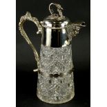 A late 19th/early 20thC cut glass claret jug, with silver plated mount cast with grapes, vines and a