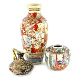 A Japanese earthenware vase, decorated in Satsuma style, a Canton porcelain ginger jar and a