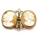 A late 19thC double cameo brooch, with two oval cameos of ladies facing each other, 22mm x 18mm,