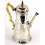 A George II silver coffee pot, of tapering form, later engraved overall with ribbons, leaves and