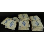 A collection of late 18th/early 19thC Delft blue and white tiles, each decorated with vases of