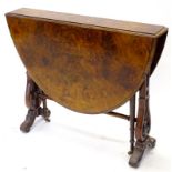 A Victorian burr walnut Sutherland table, the quarter veneered oval top with a moulded edge on