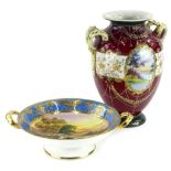 A Noritake porcelain centrepiece, hand painted centrally with an English rural landscape with an