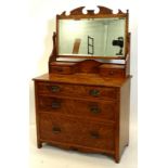 A late 19thC oak and burr oak dressing table, the rectangular mirrored plate with a shaped crest and