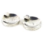 A pair of silver ashtrays, each engraved for the Grimsby and District LVA Golfing Society, the