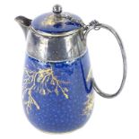 A Crescent china hot water jug, decorated with seaweed and fish in gilt on a blue ground, silver