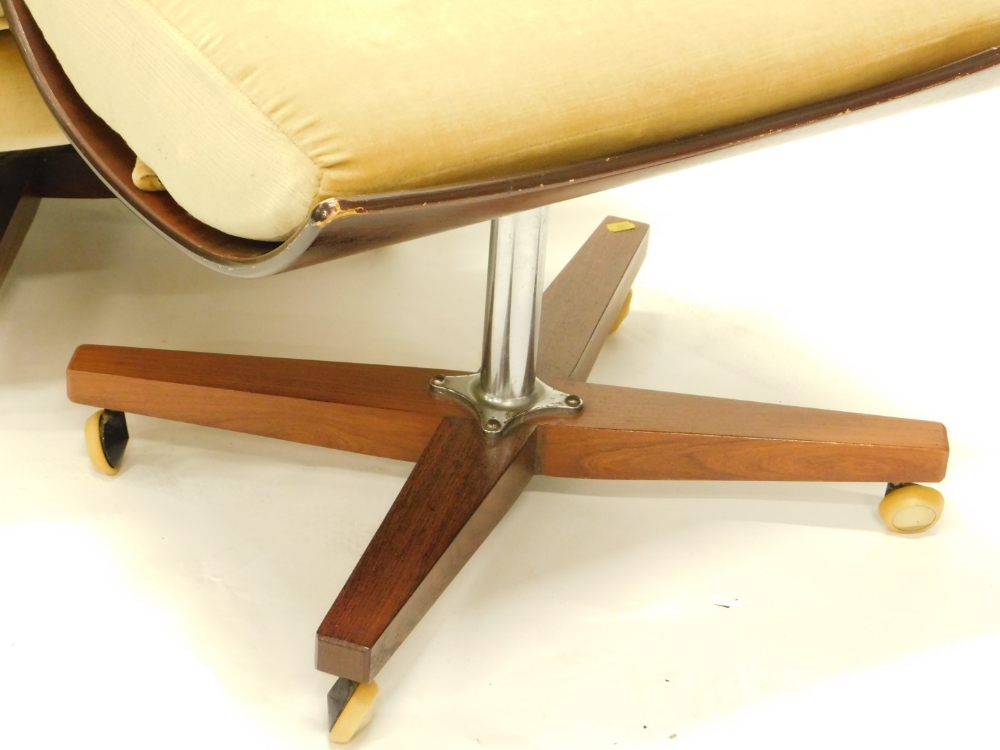 A 1960's G Plan type revolving wing armchair, with buttoned upholstery on 'X' shaped rosewood base - Image 2 of 2