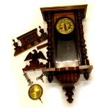A Vienna type wall clock, in walnut case, the dial with pressed decoration of a pheasant, surrounded