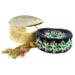An unusual Victorian embroidered velvet cap, decorated with flowers, leaves, etc., with a gold,