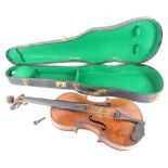 An early 20thC violin, with a two piece back, lacking label, no bow, length of back 36cm.