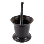A 19thC painted cast iron pestle and mortar, the mortar 17cm high.