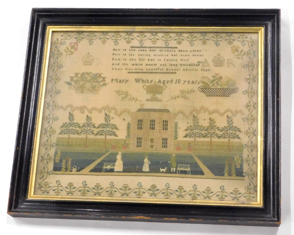 An early 19thC needlework sampler, decorated with a country house, figures, garden benches, a dog,