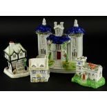 A Staffordshire pottery castle, a Coalport Old Curiosity Shop porcelain figure, etc. (4).