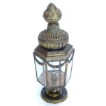 A gilt brass electric lantern, with hexagonal sides and mount for a newel post, 55cm high.