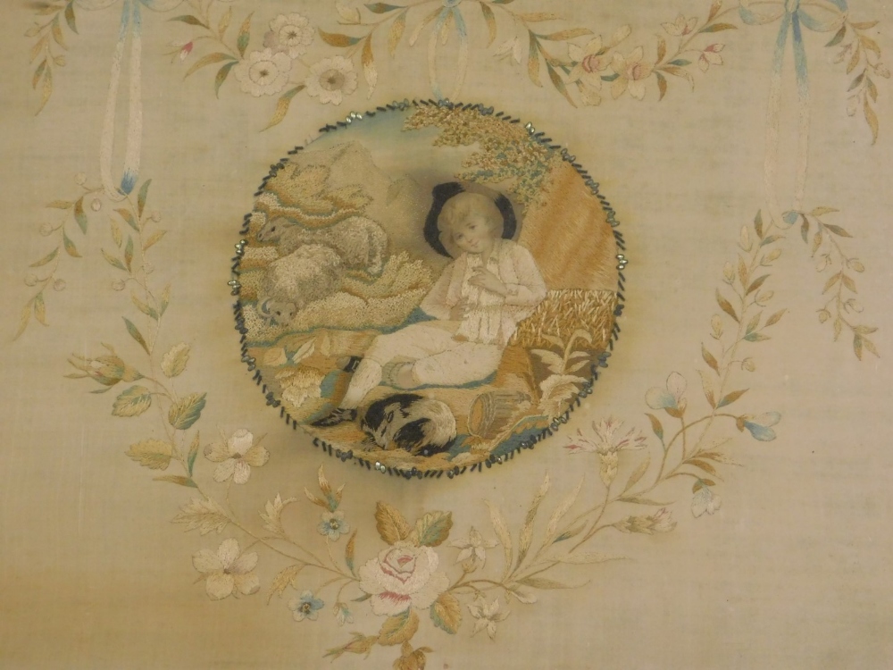 An early 19thC silk embroidered picture, decorated centrally with a young boy, sheep, etc., - Image 2 of 2