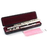 A Yamaha flute, in three sections, numbered 211SII, in fitted case.
