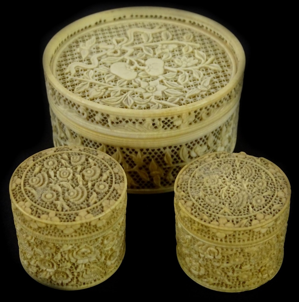 A late 19thC Chinese carved canton ivory box and cover, decorated with flowers, leaves, etc., with