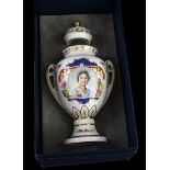 An Aynsley porcelain commemorative two handled vase and cover, no. 76/250, 23cm high.