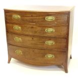 A George III mahogany bow fronted chest of drawers, the top with a moulded edge above four graduated