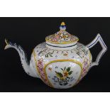 A French faience teapot, decorated with compartments of flower sprays, geometric devisers, etc.,