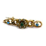 A 9ct gold and turquoise set bar brooch, with five link design set with turquoise and seed pearl