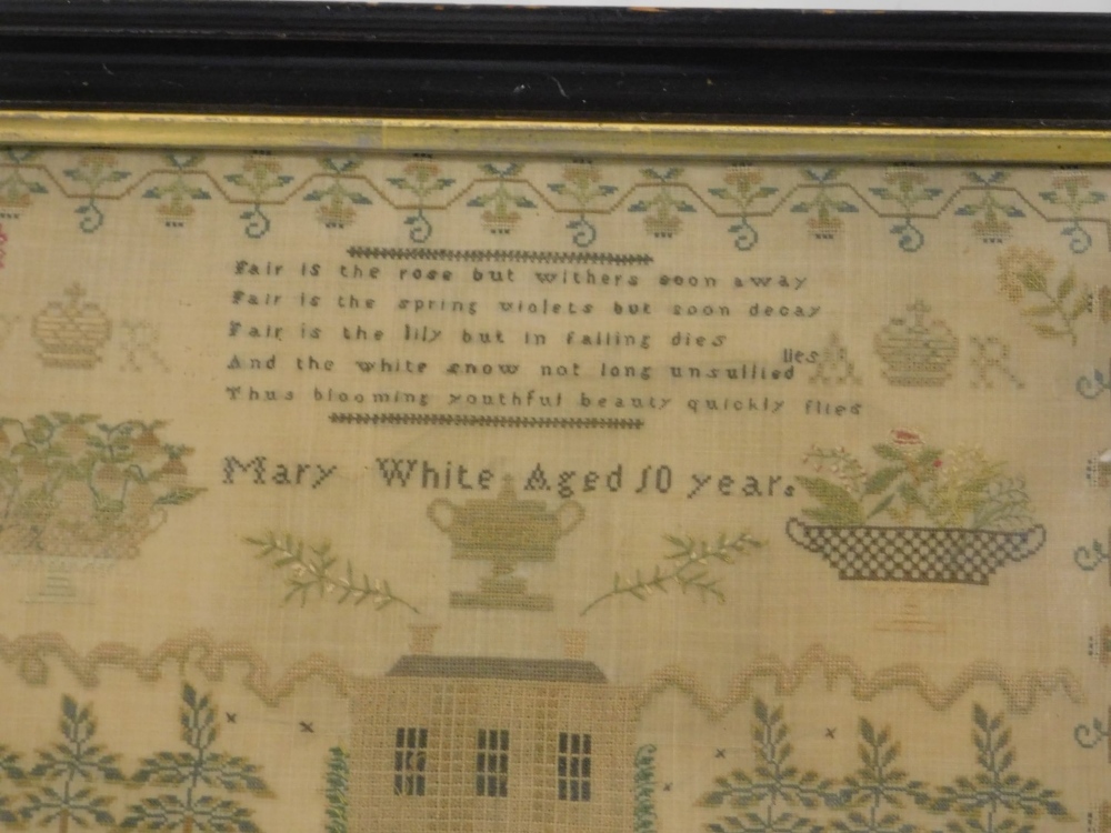 An early 19thC needlework sampler, decorated with a country house, figures, garden benches, a dog, - Image 2 of 2