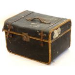 A canvas and leather small trunk, lacking tray to interior, 49cm wide.