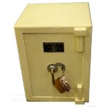 A Samuel Withers & Co Sentry safe, painted cream, with key, original receipt for purchase 1968, 53cm